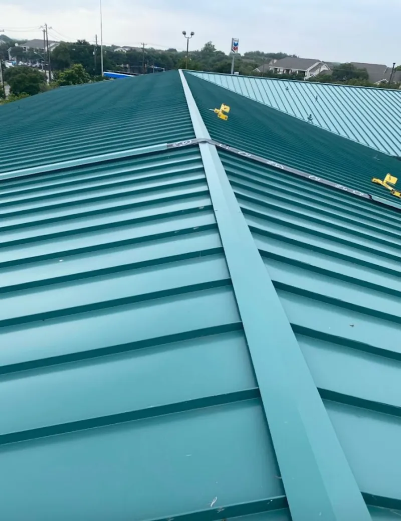 Green commercial metal roof ridge and valley for Metal Roof Repair in La Habra Heights
